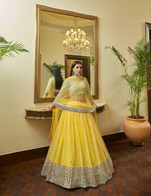 Soft Net Mirror Work Yellow Lehenga Choli - Image 2
