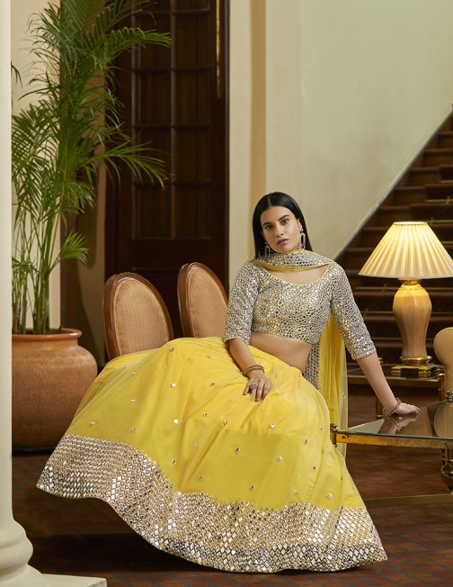 Soft Net Mirror Work Yellow Lehenga Choli