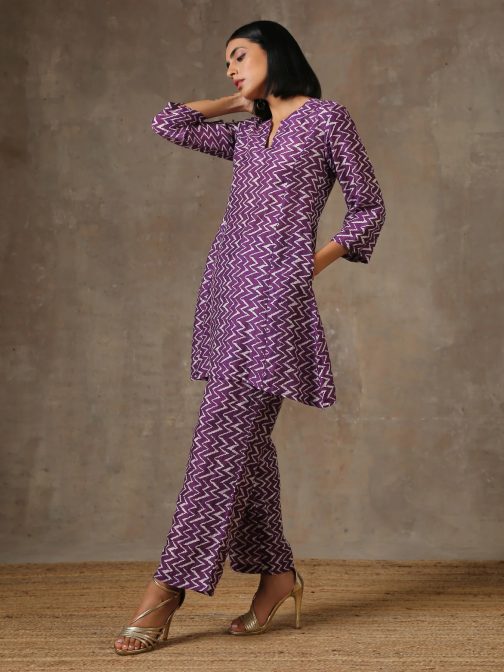 Purple Mesmerizing Printed Cotton Kurta and Plazzo Set