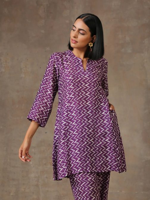 Purple Mesmerizing Printed Cotton Kurta and Plazzo Set