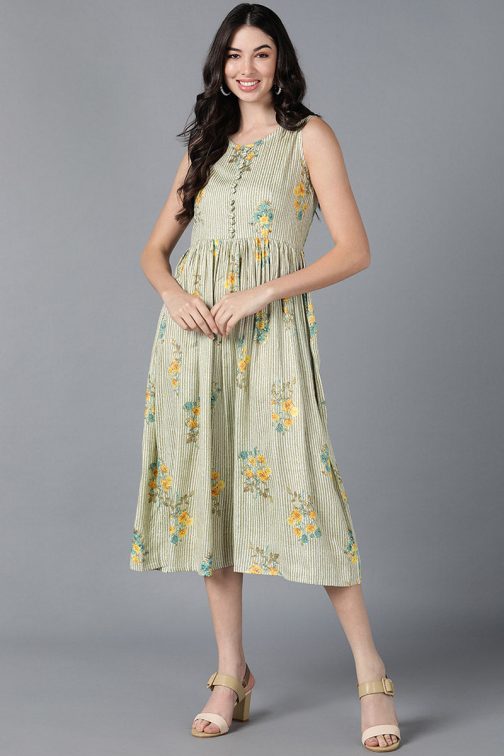 Vibrant Green Cotton Floral Printed Flared Midi Dress with a Fun and Playful Floral Pattern