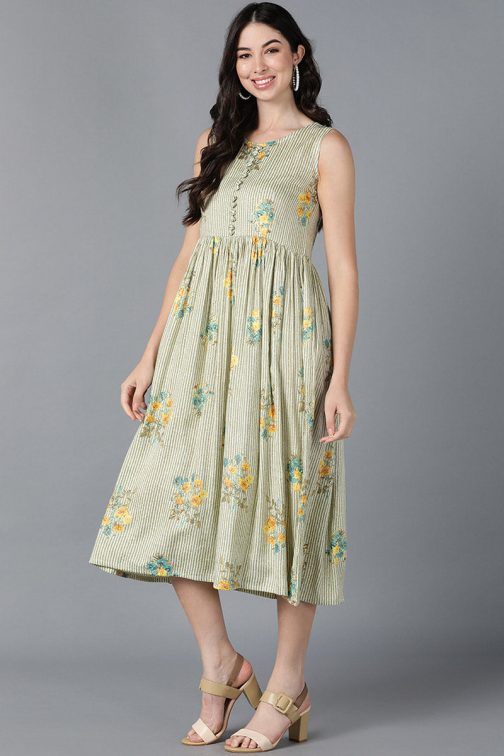 Vibrant Green Cotton Floral Printed Flared Midi Dress with a Fun and Playful Floral Pattern - Image 3