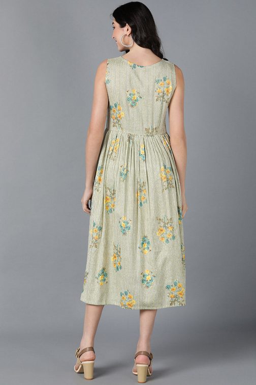Vibrant Green Cotton Floral Printed Flared Midi Dress with a Fun and Playful Floral Pattern - Image 4
