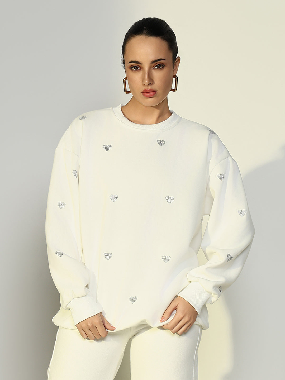 Women's White Oversized Sweatshirt with Small Embellished Heart Design - Image 2