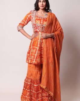 Peplum Ghatchola Bandhej silk Suit with Gota Patti work.