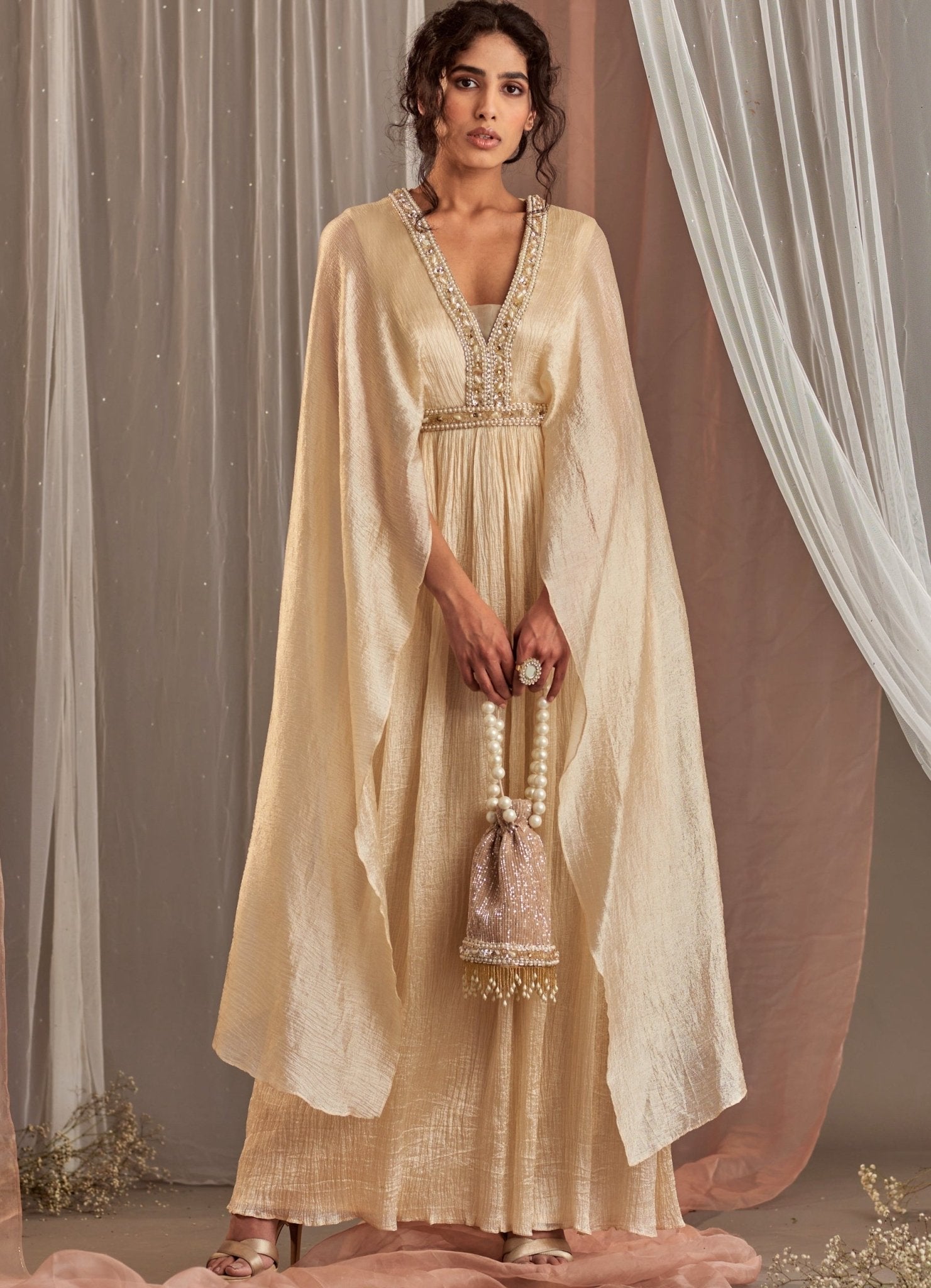 Ivory Draped Silk Gown With Long Flared Sleeves